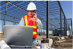 Construction Worker with Laptop